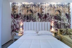Postel nebo postele na pokoji v ubytování Hotel Stella D'Oro