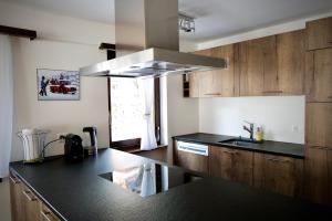 Kuchyň nebo kuchyňský kout v ubytování Residence A