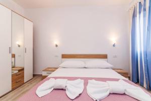 Ένα ή περισσότερα κρεβάτια σε δωμάτιο στο Premium Apartment Nera