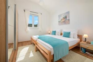 Posteľ alebo postele v izbe v ubytovaní Sun Spalato Villa Cikas + 24 fotografií
