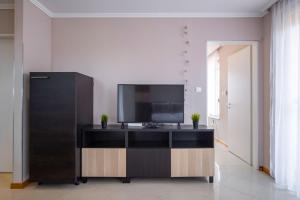 Televízia a/alebo spoločenská miestnosť v ubytovaní MyFlat Belvedere Apartment