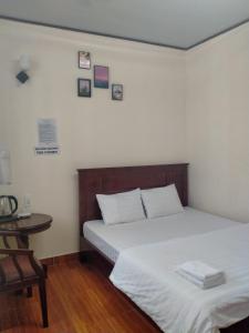 Postel nebo postele na pokoji v ubytování Minh Toàn Homestay