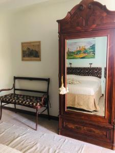 Postel nebo postele na pokoji v ubytování Tavern di Arqua'