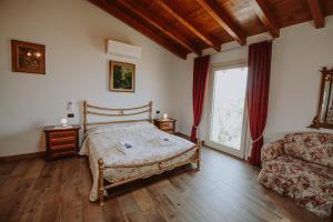 Cama o camas de una habitación en B&B Casa Santa Lucia