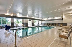a large swimming pool in a hotel room at Hyatt House Atlanta Cobb Galleria in Atlanta