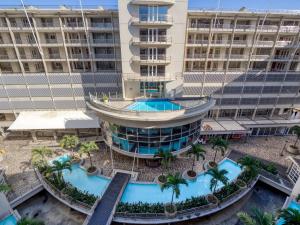 an aerial view of a building with a swimming pool at The Sails G6-07 on Timeball Boulevard in Durban