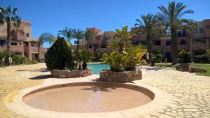 The swimming pool at or close to Attic apartment in Vera Beach with wifi and air-conditioning
