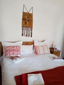 Łóżko lub łóżka w pokoju w obiekcie Casa Arthur Richis
