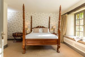 Voodi või voodid majutusasutuse BrookLodge & Macreddin Village toas
