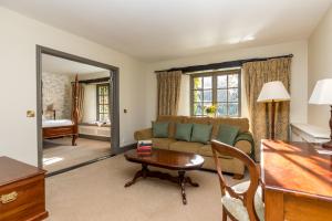 Voodi või voodid majutusasutuse BrookLodge & Macreddin Village toas