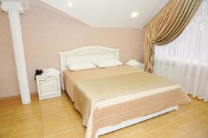 Ein Bett oder Betten in einem Zimmer der Unterkunft Hotel Goncharov