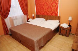 Ein Bett oder Betten in einem Zimmer der Unterkunft Hotel Goncharov