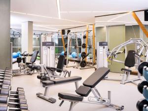 a gym with treadmills and cardio machines at Swissôtel Resort Bodrum Beach in Turgutreis