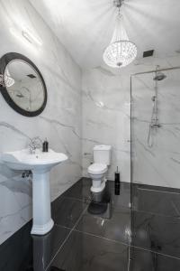 Vonios kambarys apgyvendinimo įstaigoje Apartament Royal Blue Ustka