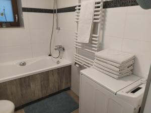 Kúpeľňa v ubytovaní Apartament z tarasem + 29 fotografií