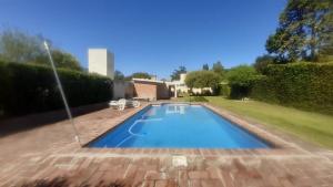 Swimmingpoolen hos eller tæt på Casa Cosquin