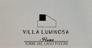 a black and white picture of a building with the words villa luminasa at Villa Luminosa in Torre del Lago Puccini
