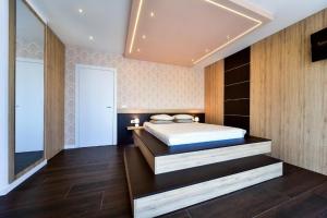 Ein Bett oder Betten in einem Zimmer der Unterkunft Aurora & Tramonto
