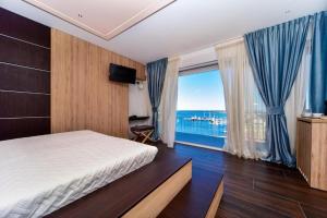 Ein Bett oder Betten in einem Zimmer der Unterkunft Aurora & Tramonto