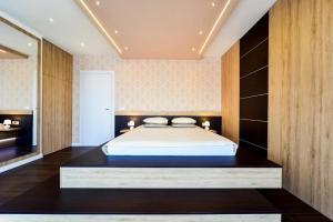 Ein Bett oder Betten in einem Zimmer der Unterkunft Aurora & Tramonto