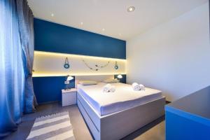 Ein Bett oder Betten in einem Zimmer der Unterkunft Aurora & Tramonto