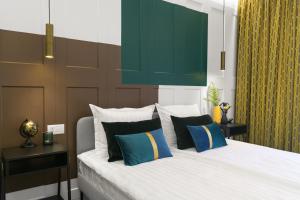 Кровать или кровати в номере Borghese apartment Grand Caravel Varna