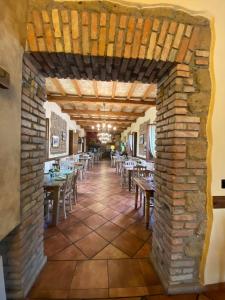 Reštaurácia alebo iné gastronomické zariadenie v ubytovaní Agriturismo Rio Coverino