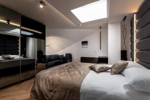 Ein Bett oder Betten in einem Zimmer der Unterkunft Hotel Cittar