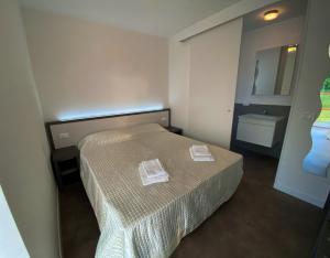 A bed or beds in a room at Agriturismo Vecio Portico