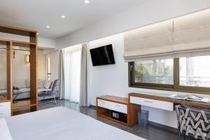 A television and/or entertainment centre at Sea View Suite "Hara" - Adults Only Még 15 kép