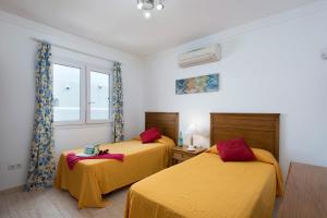 Postel nebo postele na pokoji v ubytování Villa Vesubio by Villa Plus + 14 fotografií