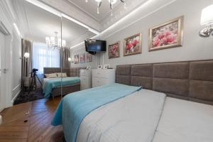 Łóżko lub łóżka w pokoju w obiekcie Luxury Apartments - Wroclaw Old Town - Wrocław Rynek