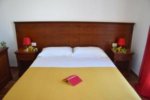 Posteľ alebo postele v izbe v ubytovaní Favignana Casa Vacanza Orsola