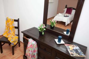 Postel nebo postele na pokoji v ubytování Casa Royal Park by Vacanzy Collection