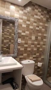 Koupelna v ubytování Apartamento Perseo + 11 fotografií