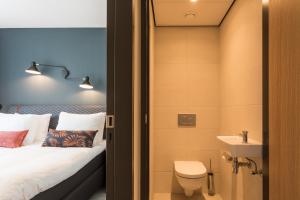 Een badkamer bij Hotel Zeeuws Licht I Kloeg Collection