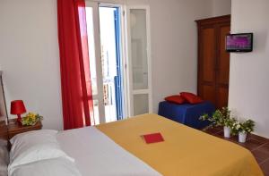 Posteľ alebo postele v izbe v ubytovaní Favignana Casa Vacanza Orsola