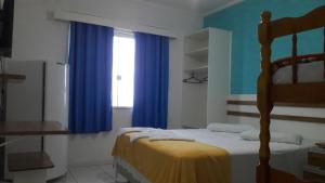 Cama ou camas em um quarto em Hotel Pousada Agua Marinha