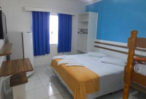 Cama ou camas em um quarto em Hotel Pousada Agua Marinha