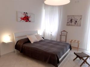 Postel nebo postele na pokoji v ubytování B&B Bell'aria