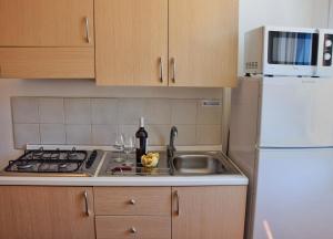 Kuchyňa alebo kuchynka v ubytovaní Favignana Casa Vacanza Orsola