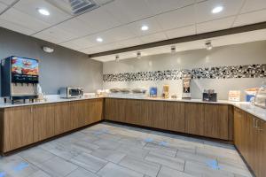 a fast food restaurant with blue arrows on the floor at Alexis Inn and Suites Hotel in Nashville