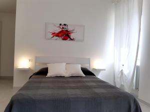 Posteľ alebo postele v izbe v ubytovaní B&B Bell'aria