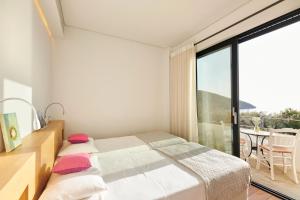 Uma cama ou camas num quarto em Cape Kitries