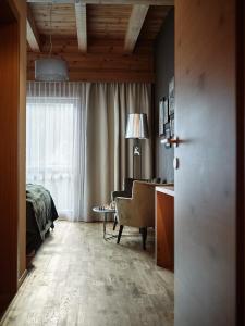 Ένα ή περισσότερα κρεβάτια σε δωμάτιο στο Boutique Apartment Sonnenhang - incl InfinityPOOL