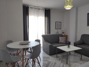 Posezení v ubytování Apartamentos Séneca junto al Centro
