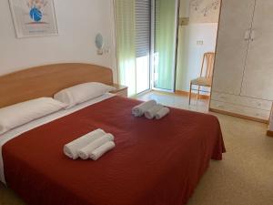 Postel nebo postele na pokoji v ubytování Hotel Chery