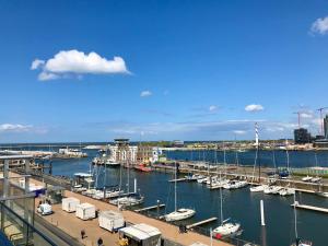 a marina with many boats in the water at Appartement Cousteau - Terras, Zeezicht, Marina in Ostend
