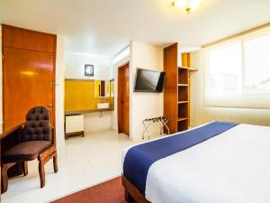 TV a/nebo společenská místnost v ubytování Hotel HC + 22 fotografií