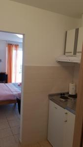 Kuchyň nebo kuchyňský kout v ubytování Apartman i sobe Martina